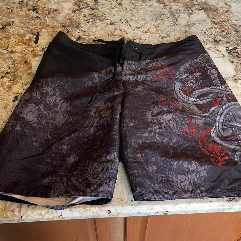 Men’s black bathing suit trunks